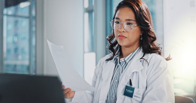 Doctor, documents and laptop for medical report, hospital schedule and planning admin for workflow. Healthcare, computer and woman on paperwork, checklist and folder for clinic and data comparison