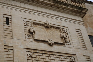 Details in the facade of the metropolitan Cathedral of Santa Maria Assunta in Lecce, Puglia, Italy.