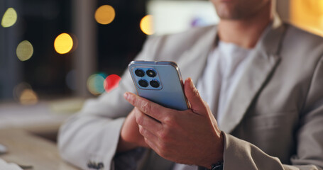 Hands, working and office with check for phone, online message or email notification at night. Male programmer, mobile tech and digital conversation on social media, smile for like with code story