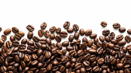 Fototapeta premium Scattered Roasted Coffee Beans on White Background