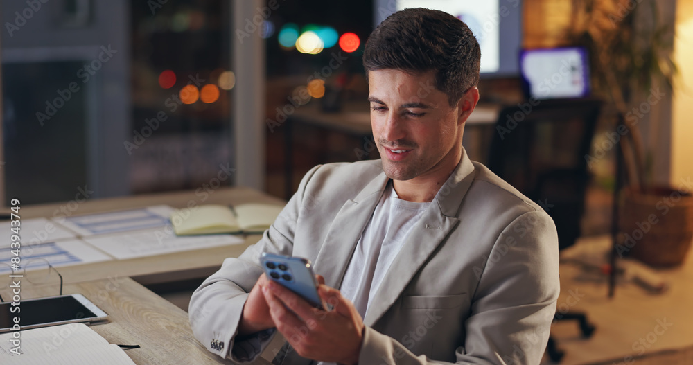 Poster Man, business and office with check for phone, online message or email notification at night. Male programmer, mobile tech and digital conversation on social media, smile for like with code story