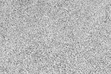 Small stone texture for background. Gravel texture. Surface of small pebble stone. Black and white