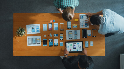 Top view of smart Ui designer brainstorming and planning about Ux Uo design or mobile interface...