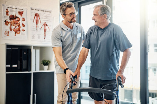 Physiotherapy, walking frame and senior man for rehabilitation, consulting and recovery. Healthcare, help and physical therapist with person with disability for medical service, wellness and support