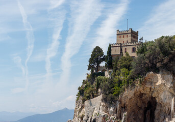 Finale ligure san donato bay and castelletto against blue sky, italy