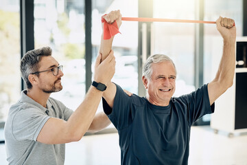 Smile, physiotherapist and old man with resistance band, stretching and senior healthcare rehabilitation. Physio, caregiver and elderly patient for mobility training, exercise and help in retirement.