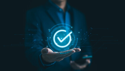 Businessman Holding Digital Check Mark Icon. standard quality control certification assurance...
