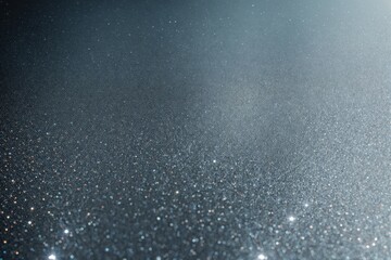 A sleek metallic dot pattern with reflective surfaces and smooth lines