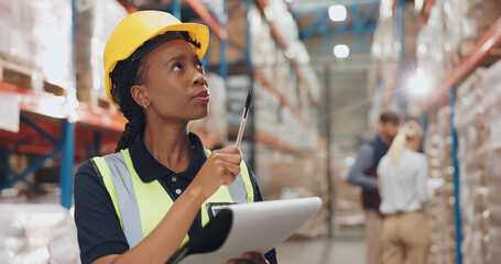 Logistics, distribution and black woman with clipboard in warehouse for stock inspection, inventory check or shipping. Freight, checklist and employee for delivery, supply chain or quality control