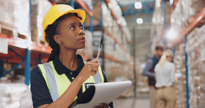 Logistics, distribution and black woman with clipboard in warehouse for stock inspection, inventory check or shipping. Freight, checklist and employee for delivery, supply chain or quality control
