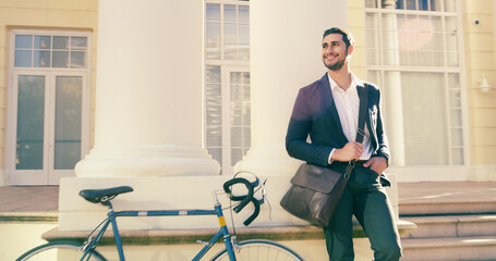 Business, travel and man with bicycle in city for interview, appointment or new job opportunity. Carbon footprint, cycling and entrepreneur with eco friendly transport in London for recruitment offer