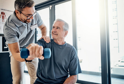 Support, physiotherapy and old man with dumbbells, healthcare and rehabilitation in medical care. Physiotherapist, consultant and elderly patient in mobility training, exercise and help in retirement