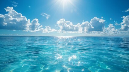 A sparkling blue sea under a clear sky