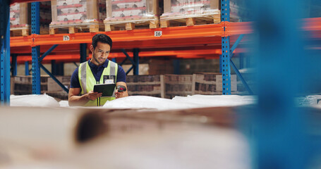 Logistics, man and tablet in warehouse with scanning, stock and price for safety in supply chain or freight. Male person, industrial and quality control in manufacturing, shipping in trade for export © Charlize Davids/peopleimages.com