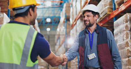 Men, handshake and warehouse for deal with logistics, smile and contract for global shipping company. People, shaking hands and happy for agreement, collaboration and supply chain for distribution