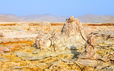 Fototapeta premium Frozen magma and mineral fields volcanic landscape, Danakil Depression desert, Afar triangle region, Ethiopia