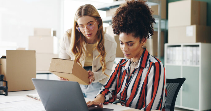 Women, laptop and box at startup, together and check inventory for order, stock or product code in workshop. People, partner and computer with reading, admin and logistics for e commerce distribution