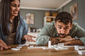 boyfriend get angry when girlfriend win him in dominoes at home