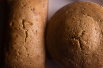 Close shot of Freshly baked cakes on a plate on a stool in a bakery