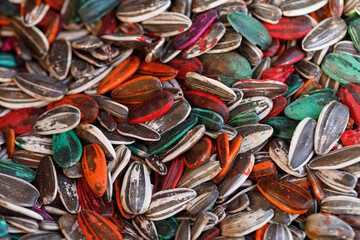 A close-up photo of colorful sunflower seeds at a traditional street market in the streets of Santa Ana in El Salvador.