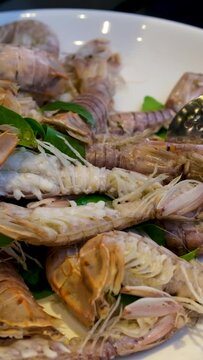 steamed crayfish or mantis shrimps or stomatopods with spicy seafood sauce