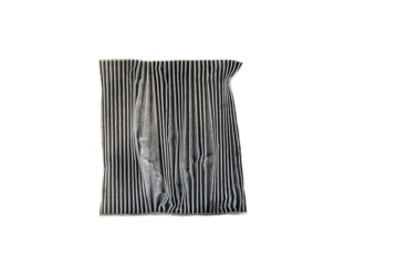 A dirty old filter an evaportor coil of an air car compressor on background, PNG format. 