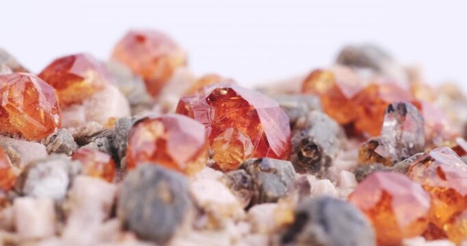 Spessartine garnet on feldspar with quartz footage, specimen from China