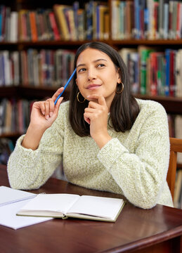 University, thinking and woman in library with idea for research, studying and learning. Education, college and happy female student with textbooks for knowledge, information and literature project