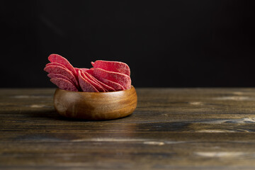 adding red dye to potato chips