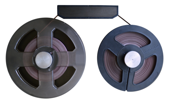 Homemade reels of tape for a tube recorder - on isolated transparent background.