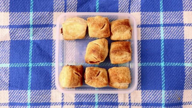 Food Family Picnic Outdoors Al Fresco Eating Hands Picking Sausage Rolls 