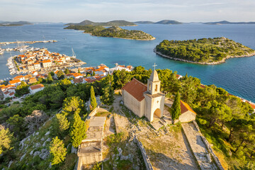 St. Nicholas church and the old town of Tribunj in Dalmatia region of Croatia