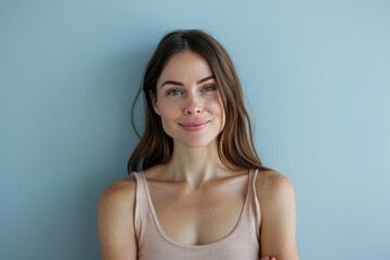 Fototapeta premium A close up portrait of a young woman with a subtle smile
