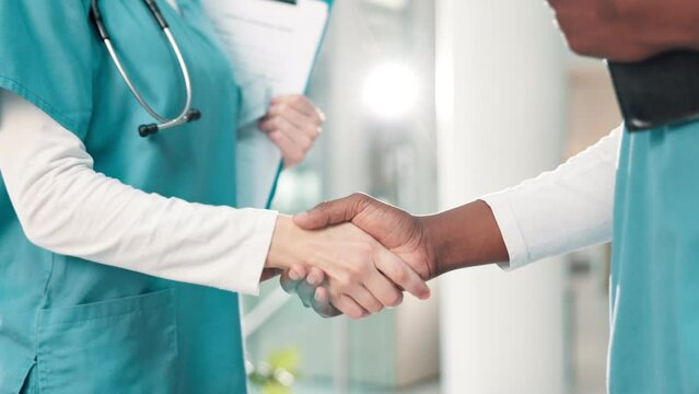 Nurse, people and shaking hands for healthcare introduction, support and welcome to residency. Medical worker with handshake for teamwork, hello and onboarding for clinic trial or hospital interview