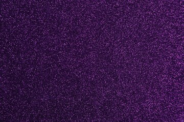 Shiny dark purple glitter as background, closeup