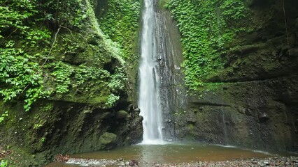 Waterfall in a tropical rainforest in Lombok, Indonesia