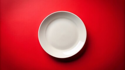 Isolated white ceramic plate centered on vibrant red background with subtle shadows, accentuating cleanliness and simplicity, perfect for food or product presentation.