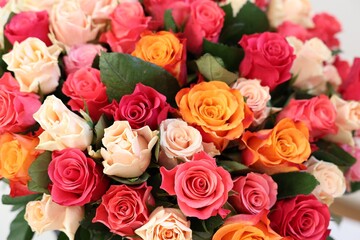 Beautiful bouquet of colorful roses, closeup view