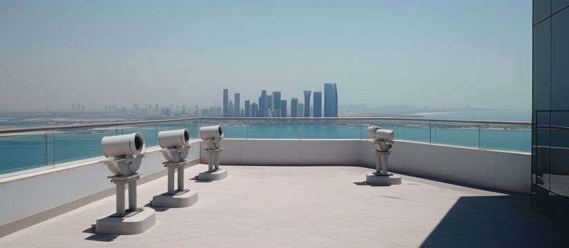 telescope on top of glass building