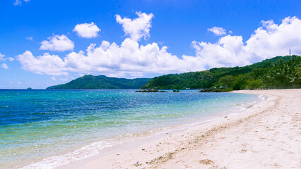 Bonbon Beach white sand on a sunny day. Romblon Island, Philippines