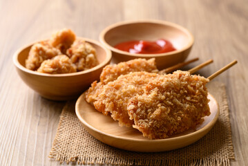 Deep fried chicken breast with stick, Thai street food