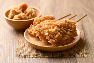 Deep fried chicken breast with stick, Thai street food