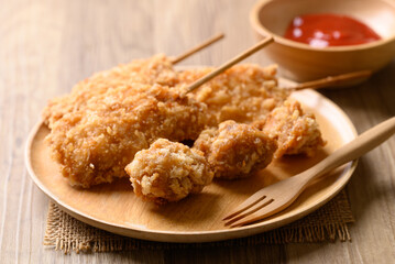 Deep fried chicken breast with stick, Thai street food