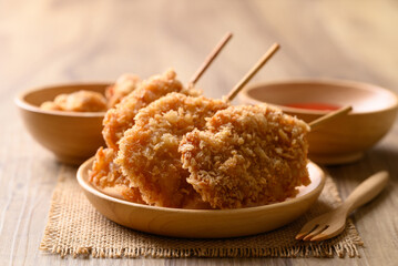 Deep fried chicken breast with stick, Thai street food