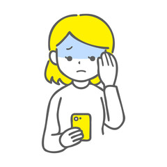 スマホを見て頭を抱えている女性