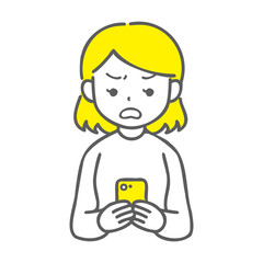 スマホを見て怒っている女性