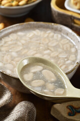 Sweet peanut soup on the wooden table  