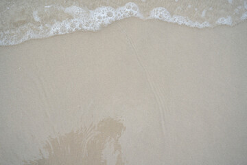 Beautiful Soft blue ocean wave on fine sandy beach