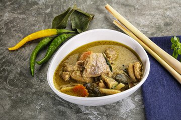Thai green curry soup with basil
