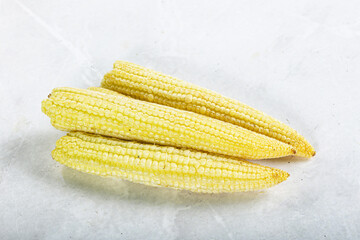 Raw sweet baby corn heap